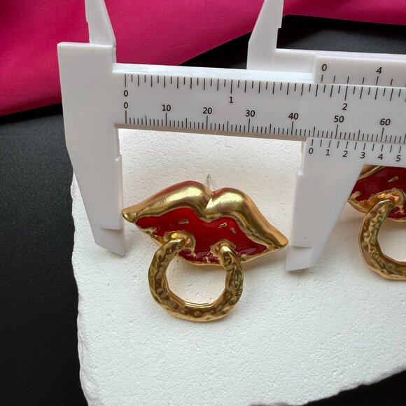 Molly Ringwald in Statement Schiaparelli Earrings at CFDA  Schiaparelli Red Lip Ring Earrings